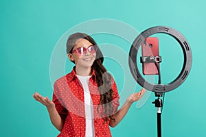 happy teen girl long hair talking on camera video blog blogging online with selfie led, weblog.