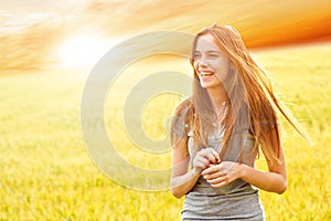 Happy teen girl outside