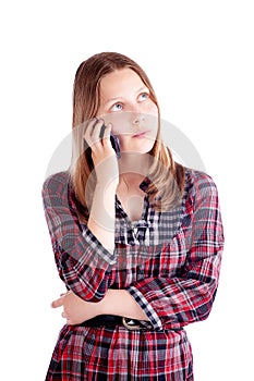 Happy teen girl talking on mobile phone