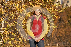 happy teen schoolgirl at school time outdoor in autumn season