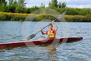 Happy Teenage Boy Kayaking