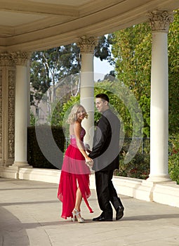 Happy Teenage Couple Going to the Prom Walking