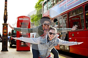 Happy teenage couple having fun in london city