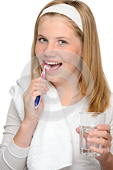 Happy teenage girl brushing teeth toothbrush denta