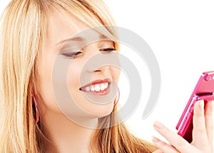 Happy teenage girl with cell phone