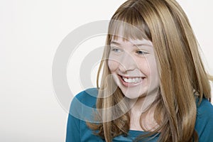 Happy Teenage Girl Looking At Copyspace