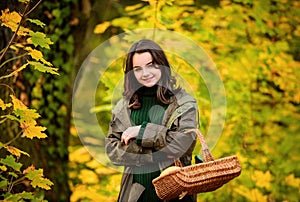 Happy teenage girl smiling. Autumn portrait of a beautiful young girl holds basket.