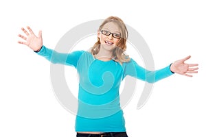 Happy teenage woman with arms wide open