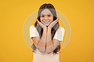 Happy teenager, positive and smiling emotions of teen girl. Headshot portrait of teenager child girl isolated on studio