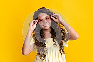 Happy teenager, positive and smiling emotions of teen girl. Pretty teenage girl in studio. Child girl portrait.