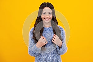 Happy teenager, positive and smiling emotions of teen girl. Pretty teenage girl in studio. Child girl portrait.