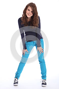 Happy teenager school girl fun in blue jeans