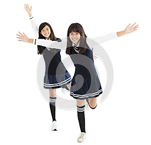 happy teenager student girls dancing