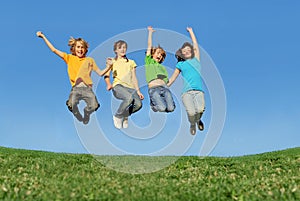 Happy teenagers jumping