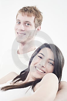 Happy teens couple laughing with joy