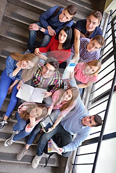 Happy teens group in school