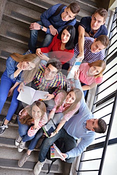 Happy teens group in school