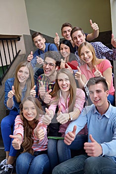 Happy teens group in school