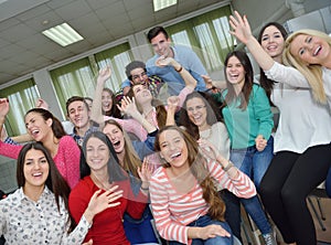 Happy teens group in school