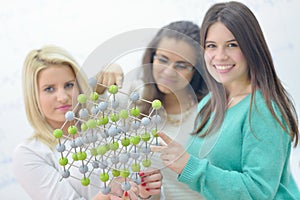 Happy teens group in school