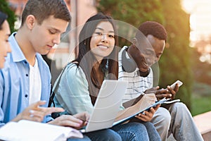 Happy Teens International Students Studying Together Outdoors, Enjoying University Life