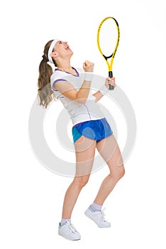 Happy tennis player rejoicing in success