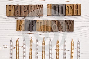 Happy 100th Birthday Spelled in Type Set photo