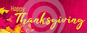 Happy Thanksgiving / autumn background banner panorama - Colorful fallen autumnal leaves on rustic pink magenta wooden wall /