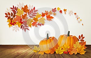 Happy Thanksgiving background with autumn vegetables and colorful leaves.
