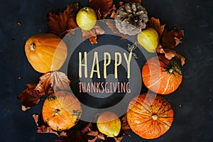 Happy thanksgiving day background. Autumn frame made of pumpkins, maple leaves, pears and pine cone.