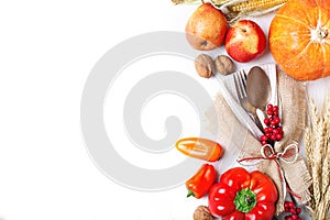 Happy Thanksgiving Day background, table decorated with Pumpkins, Maize, fruits and autumn leaves. Harvest festival. The
