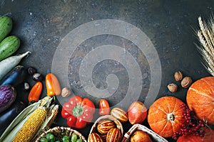Happy Thanksgiving Day background, table decorated with Pumpkins, Maize, fruits and autumn leaves. Harvest festival. The