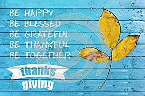 Happy thanksgiving day with design poster on blue wooden