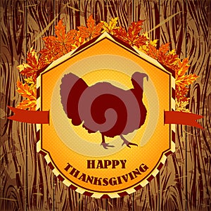 Happy Thanksgiving day. Vintage hand drawn vector illustration with turkey and autumn leaves on wooden background.