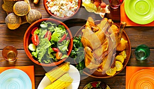 Happy Thanksgiving! Festive table with baked chicken