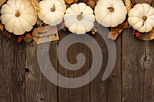 Happy Thanksgiving gift tag with top border of white pumpkins over wood