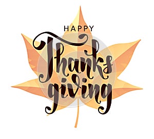 Happy Thanksgiving. Hand writting lettering isolated on maple leaf