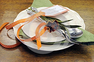 Happy Thanksgiving individual dinner table place setting with autumn flowers