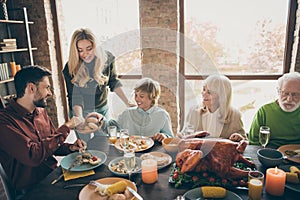 Happy thanksgiving. Photo of big family gathering sit feast meals dinner table wife giving everybody fresh baked bread