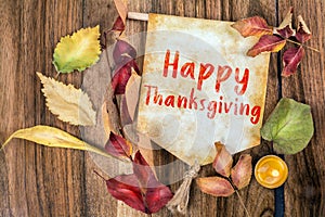 Happy thanksgiving text with autumn theme