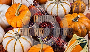 Happy Thanksgiving Text With Pumpkins and Corn