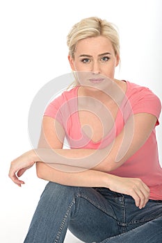 Happy Thoughtful Attractive Relaxed Young Woman Sitting on the Floor