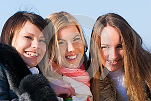 Happy three beautiful young women