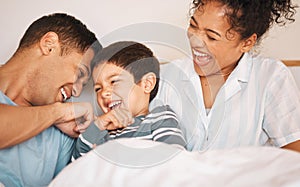 Happy, tickle and smile with family in bedroom for playful, morning and love. Care, support and wake up with parents and