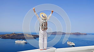 Happy time with sucessful of young man in white dress as happy freedom lifestyle in Aegean sea mediterranean