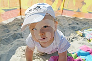 Happy toddler on the beach