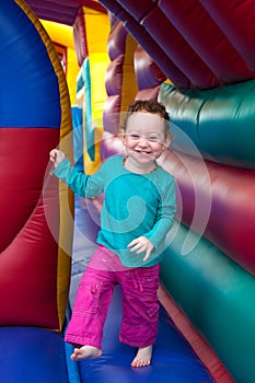 Happy toddler bounce in trampoline