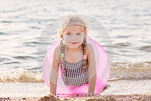 Happy Toddler girl with inflatable circle