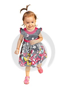 Happy toddler girl running