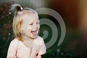 Happy Toddler Laugh Outdoors Nature Summertime. Good Mood